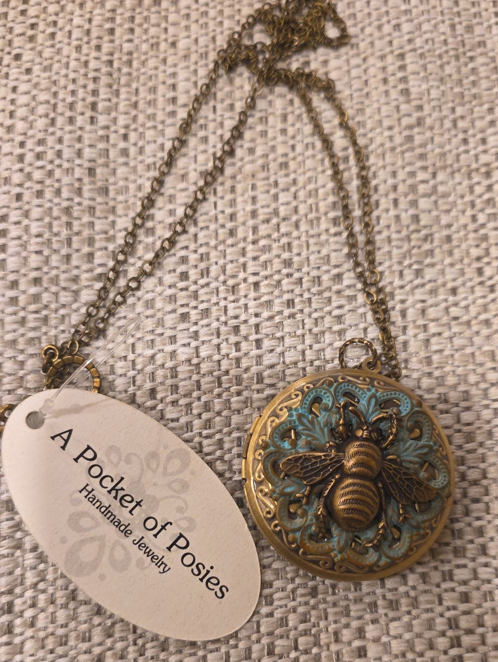 A Pocket of Posies Bee Locket Necklace in Antique Gold and Turquoise